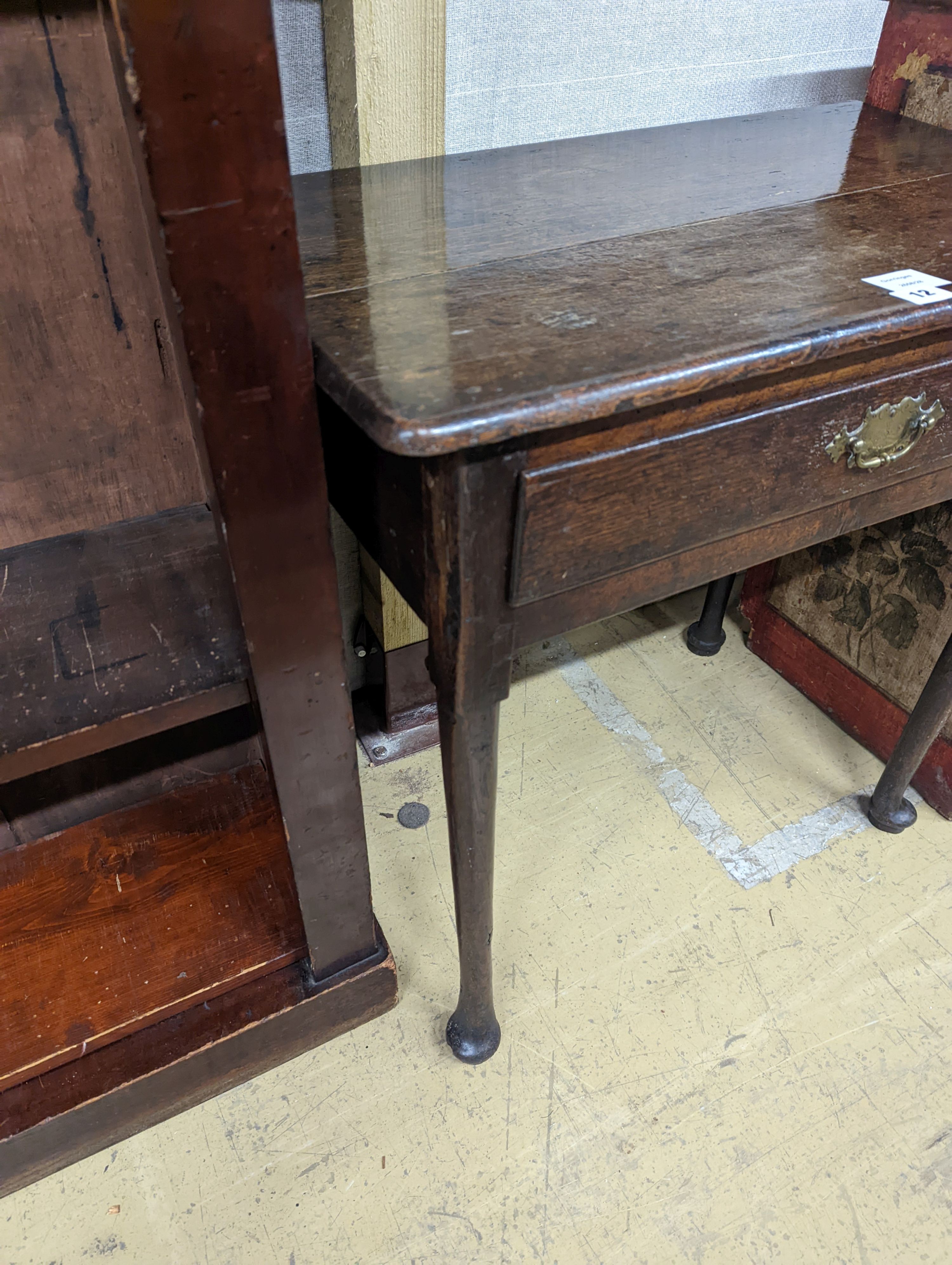 A small early 18th century oak lowboy, width 68cm, depth 41cm, height 68cm